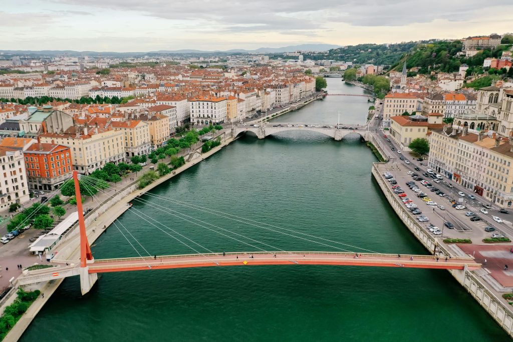 pexels-photo-8430275-8430275 A scenic aerial view of Lyon, France featuring Saone River and iconic bridges.