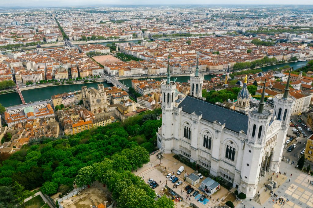 pexels-photo-8430276-8430276 Stunning aerial view of Lyon featuring the Basilica of Notre-Dame de Fourvière and the cityscape.